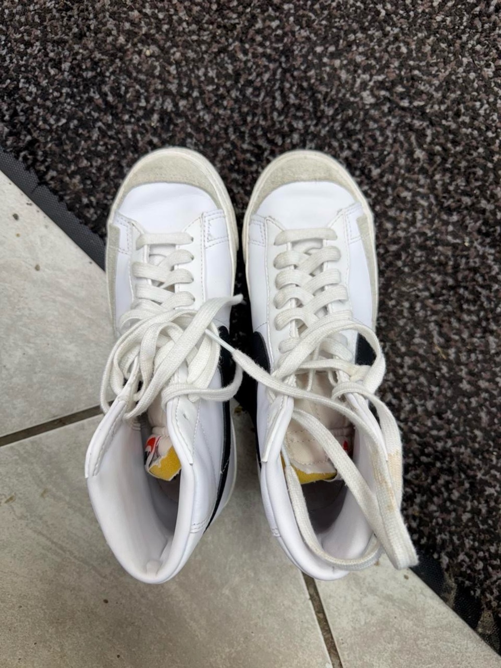 Nike White High-Top Sneakers with Black Swoosh and Beige Accents